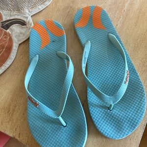 Pair of Hurley flip flops, turquoise EUC
